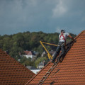 Partner with a Real Estate Agent for Seamless Roofing Replacement